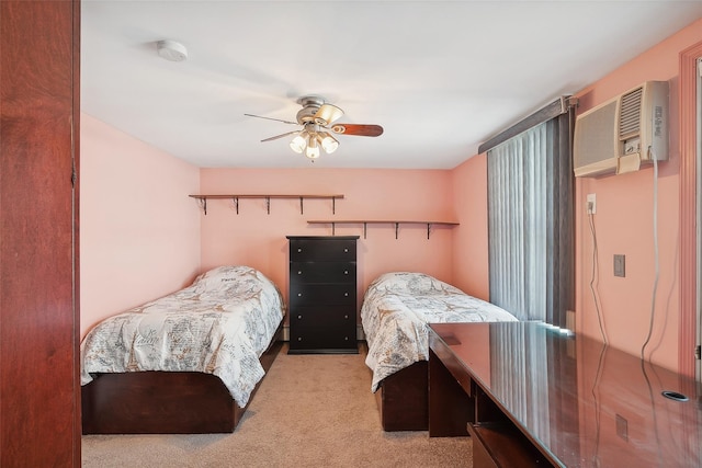 bedroom featuring light carpet, a wall unit AC, and ceiling fan