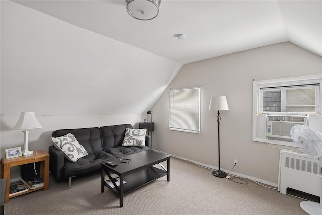 living room featuring carpet, radiator heating unit, vaulted ceiling, and cooling unit