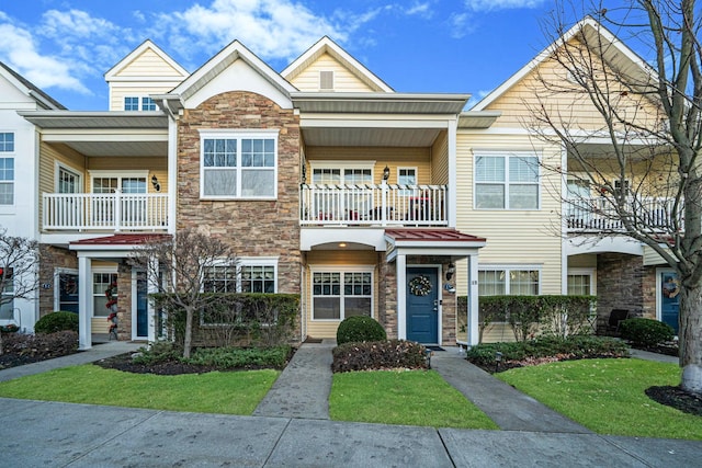 view of property with a balcony