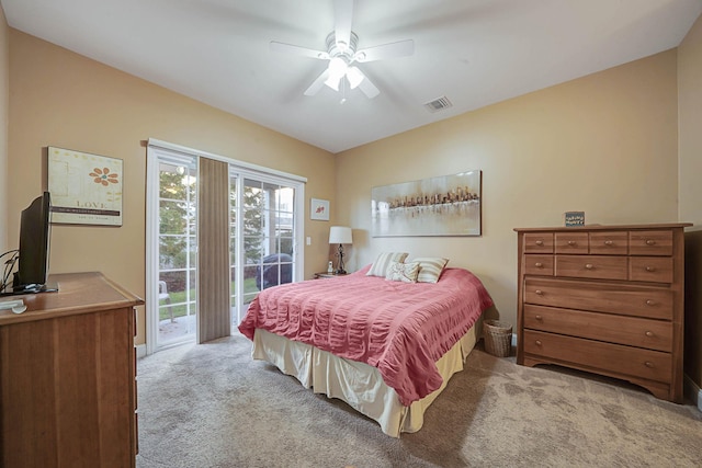 bedroom featuring ceiling fan, access to exterior, and light colored carpet