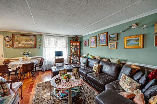 135 Post Ave Unit 5U, Westbury, NY 11590 - living room with crown molding, a textured ceiling, and wood finished floors