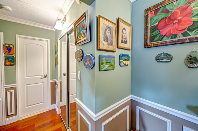 135 Post Ave Unit 5U, Westbury, NY 11590 - corridor featuring wood finished floors and ornamental molding
