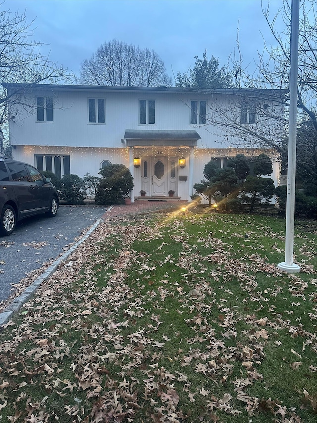 view of front of property with a front lawn