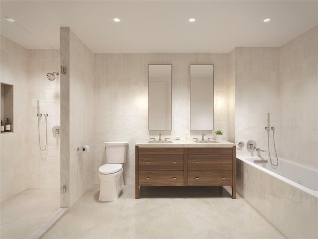 full bathroom with vanity, toilet, tile walls, and independent shower and bath