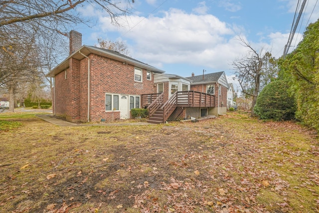 rear view of house with a deck