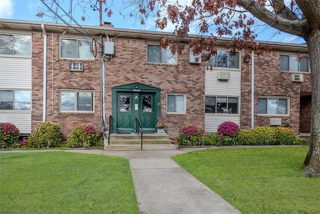 view of property with french doors and a front yard