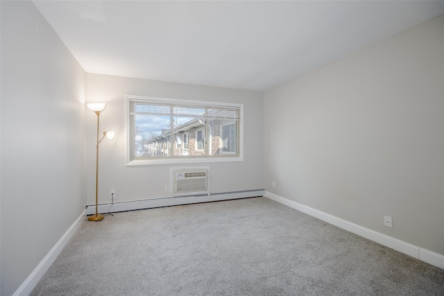 unfurnished room with baseboard heating, carpet floors, and an AC wall unit