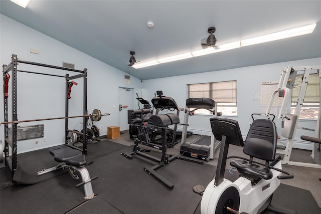 exercise room with lofted ceiling