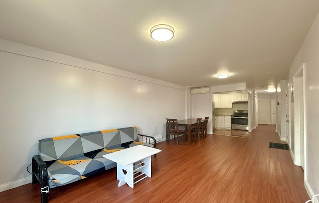 living room featuring dark hardwood / wood-style floors