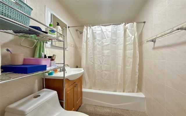 full bathroom featuring toilet, tile walls, and shower / bath combo with shower curtain