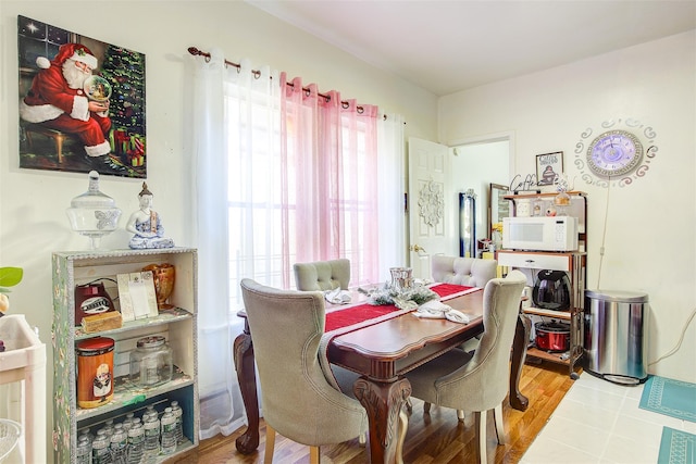 dining space featuring light hardwood / wood-style flooring