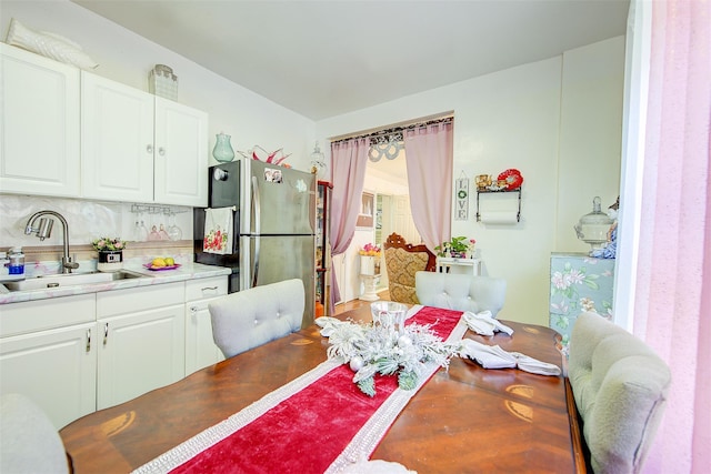 dining area featuring sink