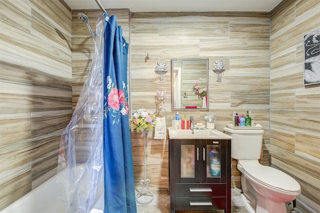 full bathroom featuring shower / bath combo, toilet, and sink