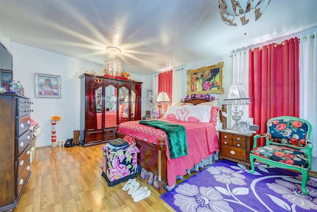 bedroom featuring light wood-type flooring