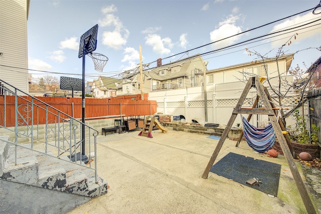 view of patio with a playground