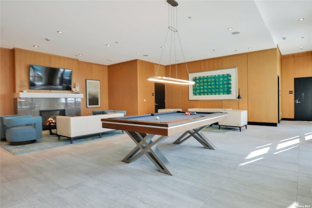 playroom featuring billiards and wooden walls