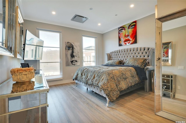 bedroom featuring light hardwood / wood-style floors