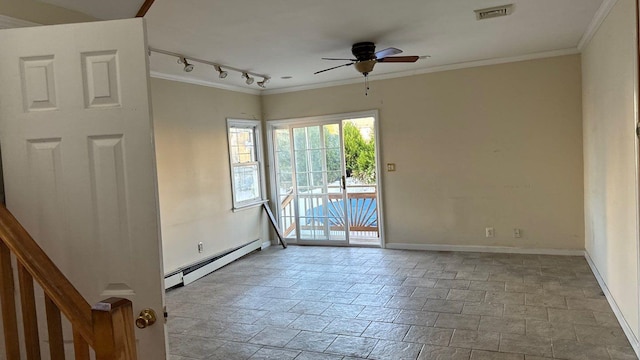 unfurnished room featuring a baseboard radiator, track lighting, ceiling fan, and crown molding