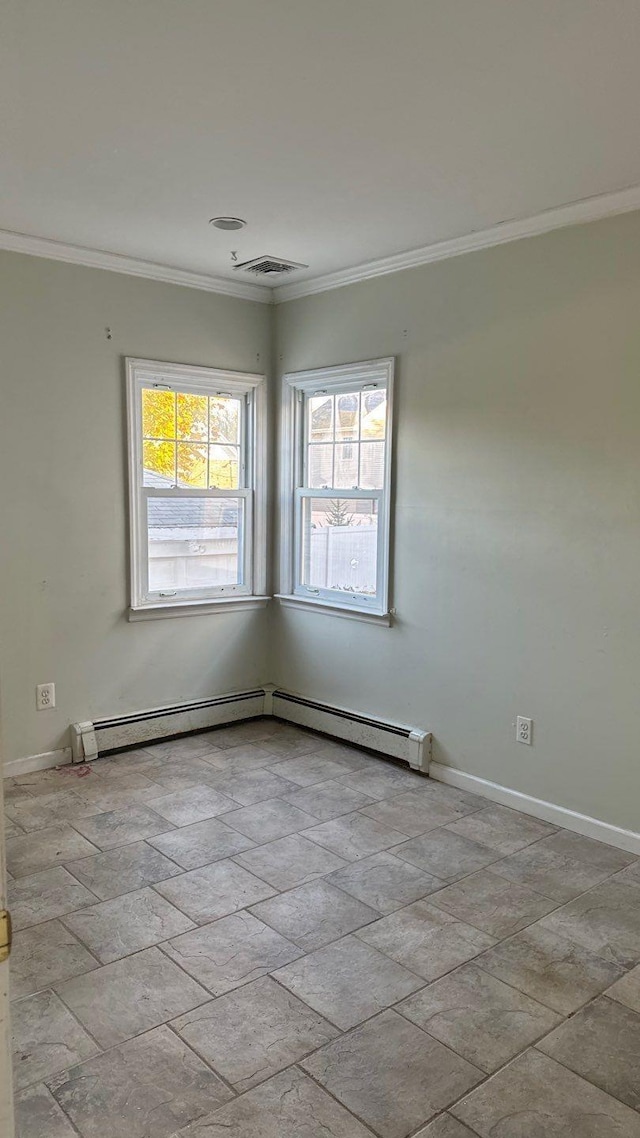 empty room featuring a baseboard radiator and crown molding