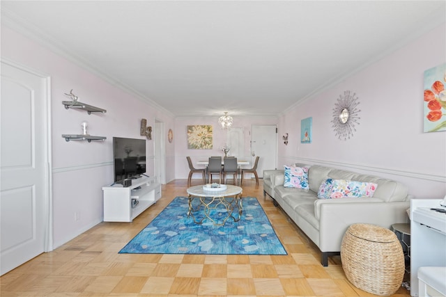 living room featuring ornamental molding and light parquet flooring