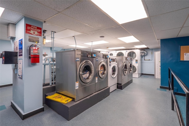 clothes washing area featuring independent washer and dryer