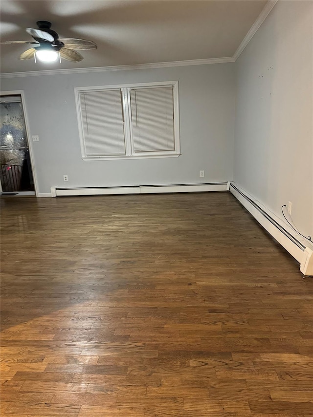 unfurnished room with dark hardwood / wood-style flooring, baseboard heating, and crown molding