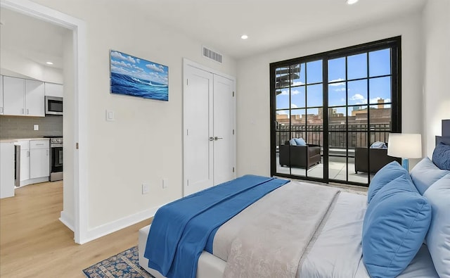 bedroom featuring light hardwood / wood-style flooring