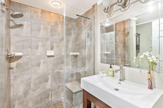 bathroom featuring vanity and walk in shower