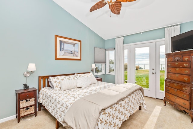 carpeted bedroom with ceiling fan, access to exterior, and lofted ceiling