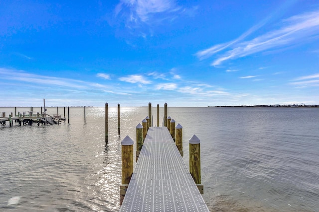 view of dock with a water view