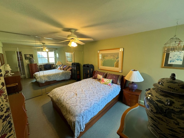 bedroom featuring carpet and ceiling fan