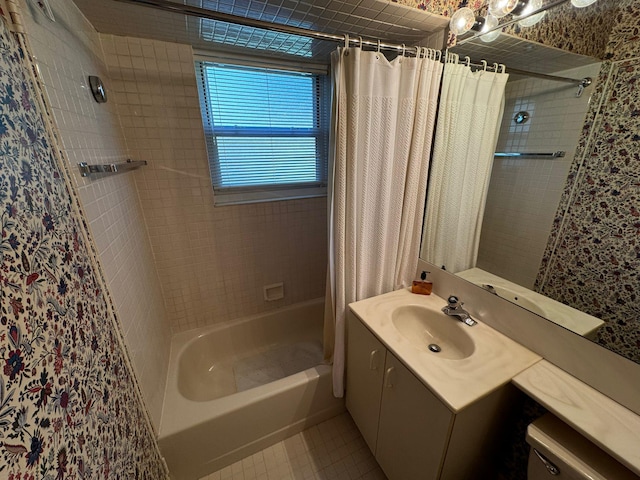 bathroom with tile patterned floors, vanity, and shower / bath combo