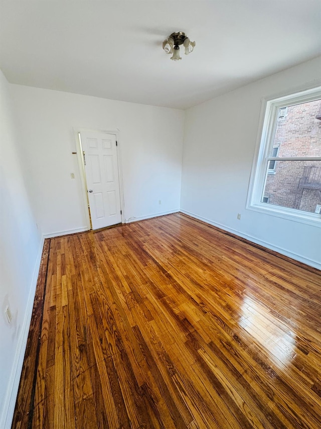 empty room featuring hardwood / wood-style floors