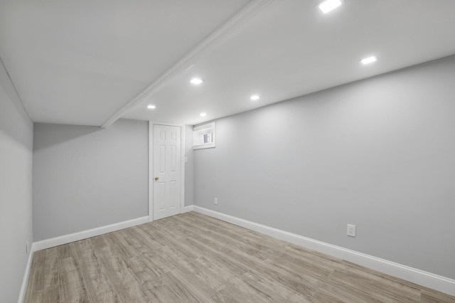 basement featuring light hardwood / wood-style flooring