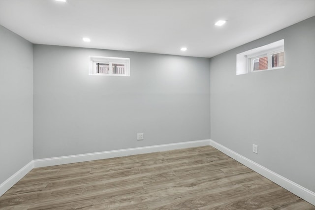 basement featuring light wood-type flooring