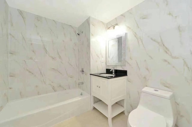 full bathroom with vanity, toilet, tile walls, and tiled shower / bath combo