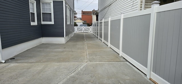 view of side of home with a patio area