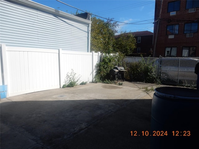 view of patio featuring a grill