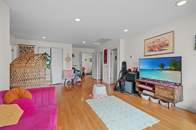 recreation room featuring hardwood / wood-style floors