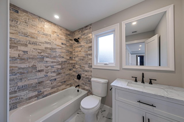 full bathroom featuring bathing tub / shower combination, vanity, and toilet