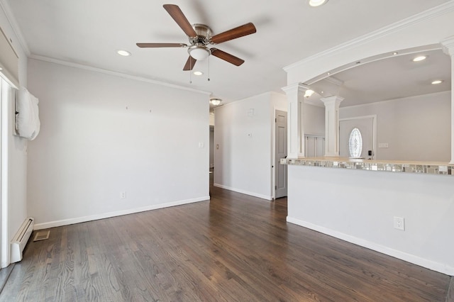 spare room with recessed lighting, dark wood-style flooring, ornamental molding, and decorative columns