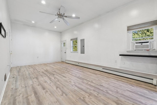 unfurnished living room with electric panel, recessed lighting, wood finished floors, a ceiling fan, and a baseboard radiator