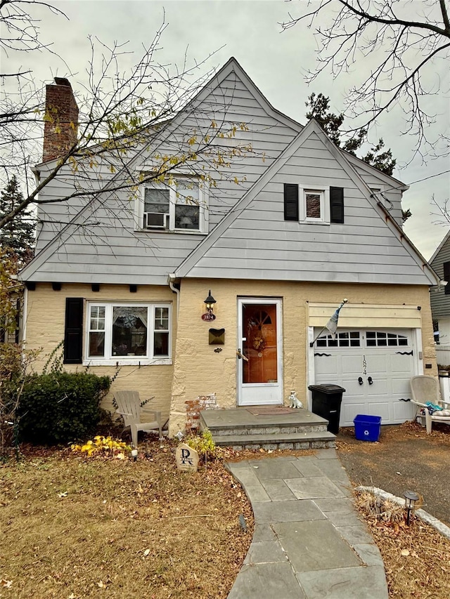 view of front of property with a garage