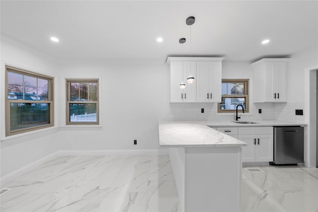 kitchen featuring dishwasher, a healthy amount of sunlight, white cabinetry, and sink