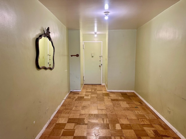 hallway with light parquet flooring