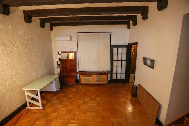 hallway with dark parquet floors, beamed ceiling, and a wall mounted air conditioner