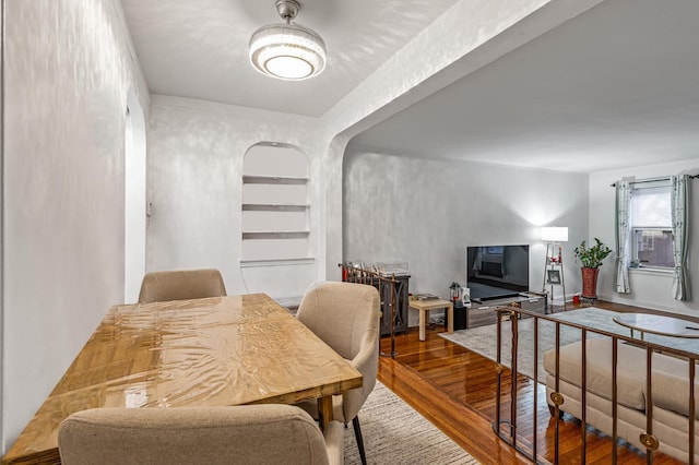 dining room featuring wood-type flooring