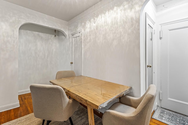 dining room with hardwood / wood-style flooring