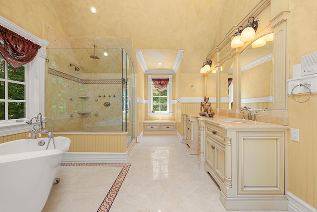 bathroom with vanity, lofted ceiling, and shower with separate bathtub