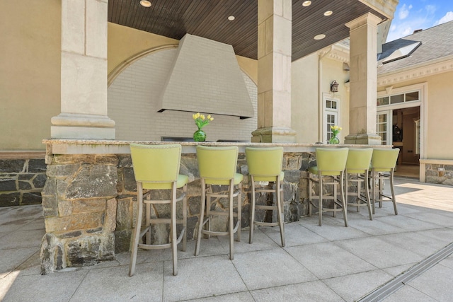 view of patio / terrace featuring a bar